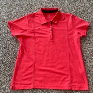 Women’s orange crystal downs polo hundred percent polyester like new $10